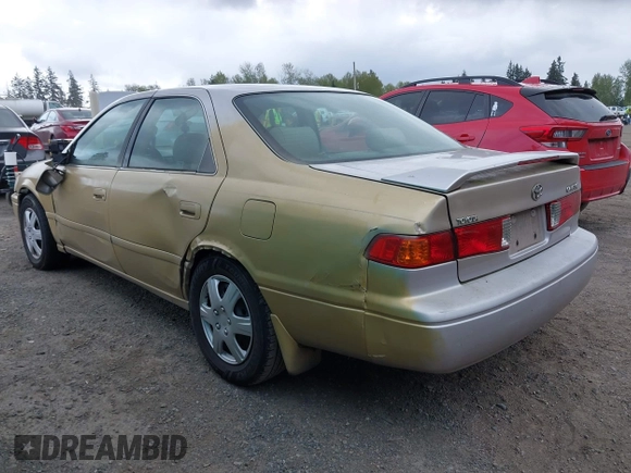 2001 Toyota Camry CE with VIN 4T1BG22K91U016864, listed as a IAAI auction lot 42068573 with 251,307 mi miles. Bid and sale history available at carsss.com. Image 3.