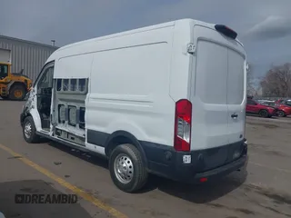 2020 Ford Transit Cargo with VIN 1FTBR2CG1LKB43034, listed as a IAAI auction lot 41668193 with 56,827 mi miles and . Bid and sale history available at DreamBid. Image 3.