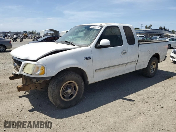 2003 Ford F-150 XL with VIN 2FTRX17213CA05950, listed as a Copart auction lot 54435115 with 310,503 mi miles and Salvage title. Bid and sale history available at DreamBid. Image 1.