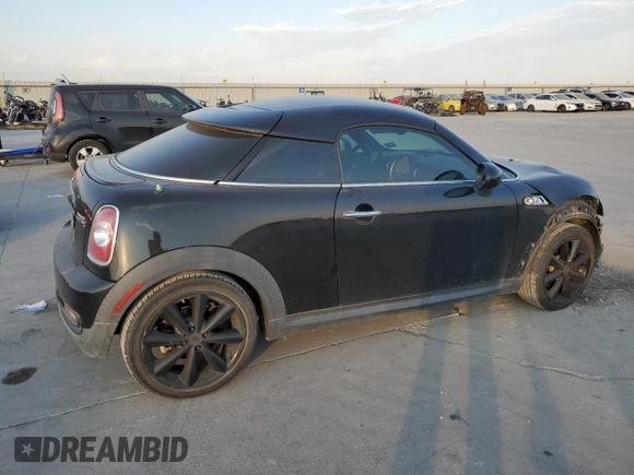 2013 MINI Coupe S z VIN WMWSX3C57DT408719, wystawiony jako Copart lot #75440574 z przebiegiem Nie podano mil oraz Szkoda całkowita • Salvage title. Historia ofert i sprzedaży dostępna na DreamBid. Obrazek 3.