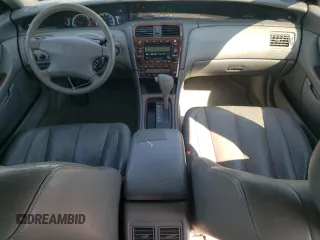 2000 Toyota Avalon XL with VIN 4T1BF28B7YU112576, listed as a Copart auction lot 59726505 with 242,412 mi miles and Salvage title. Bid and sale history available at DreamBid. Image 8.