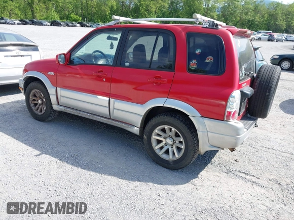 2005 Suzuki Grand Vitara LX with VIN JS3TD62VX54201211, listed as a IAAI auction lot 42220221 with 242,165 mi miles and . Bid and sale history available at DreamBid. Image 3.