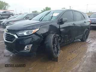 2021 Chevrolet Equinox LS z VIN 2GNAXSEV9M6142819, wystawiony jako IAAI lot #42200279 z przebiegiem 82 669 mil mil oraz . Historia ofert i sprzedaży dostępna na DreamBid. Obrazek 2.