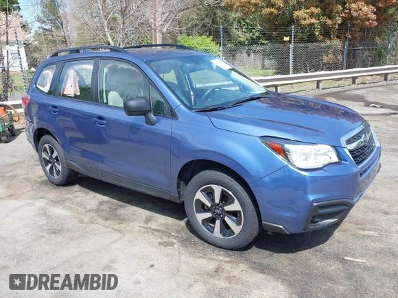 2018 Subaru Forester z VIN JF2SJABC9JH525596, wystawiony jako IAAI lot #41941424 z przebiegiem 32 622 mil mil oraz . Historia ofert i sprzedaży dostępna na DreamBid. Obrazek 1.