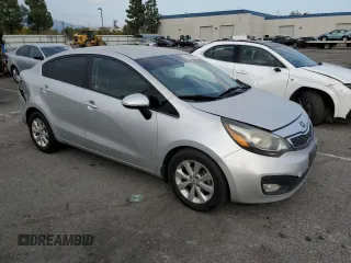 2014 Kia Rio EX z VIN KNADN4A30E6353469, wystawiony jako Copart lot #43788955 z przebiegiem 156 096 mil mil oraz Szkoda całkowita • Salvage title. Historia ofert i sprzedaży dostępna na DreamBid. Obrazek 4.