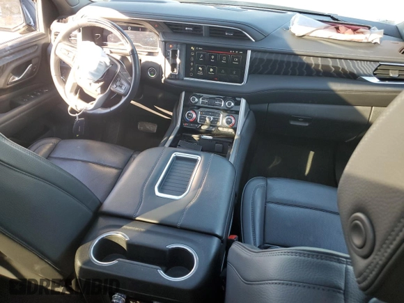 2024 GMC Yukon Denali with VIN 1GKS2DKL8RR173831, listed as a Copart auction lot 87831265 with 32,872 mi miles and Salvage Title. Bid and sale history available at carsss.com. Image 8.