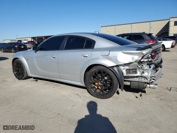 2022 Dodge Charger Scat Pack Widebody with VIN 2C3CDXGJ2NH101072, listed as a Copart auction lot 83835514 with 4,992 mi miles and Salvage Title. Bid and sale history available at carsss.com. Image 2.