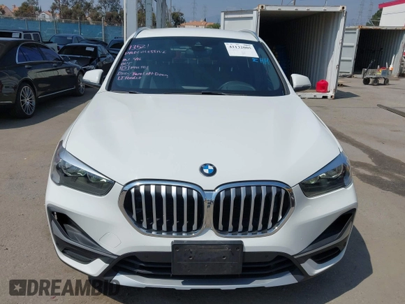 2021 BMW X1 sDrive28i z VIN WBXJG7C01M3M73496, wystawiony jako IAAI lot #42132005 z przebiegiem 23 278 mil mil oraz . Historia ofert i sprzedaży dostępna na DreamBid. Obrazek 12.