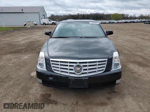 2007 Cadillac DTS Performance with VIN 1G6KD57937U201301, listed as a Copart auction lot 52868565 with 119,972 mi miles and Salvage Title. Bid and sale history available at carsss.com. Image 5.