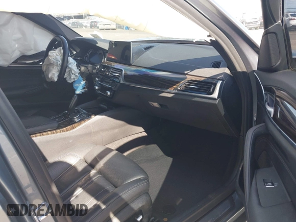 2018 BMW 5 Series 530i xDrive with VIN WBAJA7C54JWA74490, listed as a IAAI auction lot 41986285 with 68,768 mi miles and . Bid and sale history available at DreamBid. Image 5.