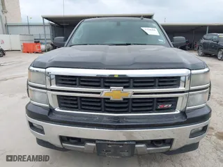 2014 Chevrolet Silverado 1500 LT with VIN 3GCUKREC5EG493728, listed as a IAAI auction lot 41710490 with 243,509 mi miles. Bid and sale history available at carsss.com. Image 12.