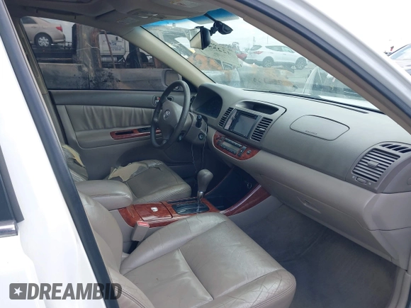 2003 Toyota Camry LE with VIN JTDBE32K530180834, listed as a IAAI auction lot 42255688 with 134,594 mi miles and . Bid and sale history available at DreamBid. Image 5.