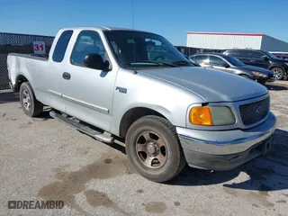 2004 Ford F-150 Heritage XL with VIN 2FTRX17244CA31380, listed as a IAAI auction lot 41753528 with 1 mi miles. Bid and sale history available at carsss.com. Image 1.