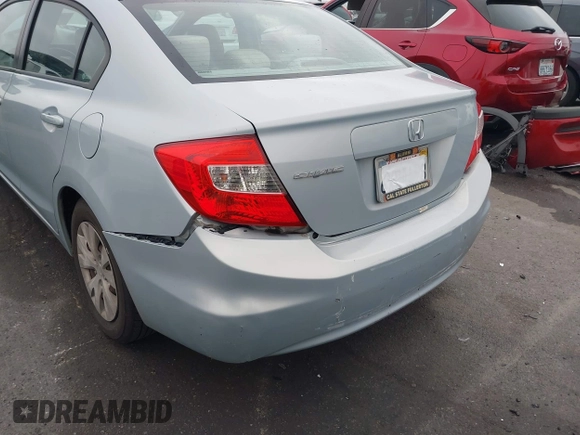 2012 Honda Civic LX with VIN 2HGFB2F58CH560126, listed as a IAAI auction lot 42097094 with 149,921 mi miles and . Bid and sale history available at DreamBid. Image 6.