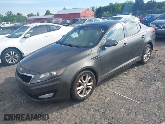 2013 Kia Optima EX with VIN 5XXGN4A78DG176690, listed as a IAAI auction lot 42196301 with 300,717 mi miles and . Bid and sale history available at DreamBid. Image 2.