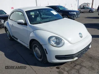 2012 Volkswagen Beetle 2.5L PZEV with VIN 3VWHP7AT6CM622309, listed as a IAAI auction lot 41681789 with 135,155 mi miles. Bid and sale history available at carsss.com. Image 1.