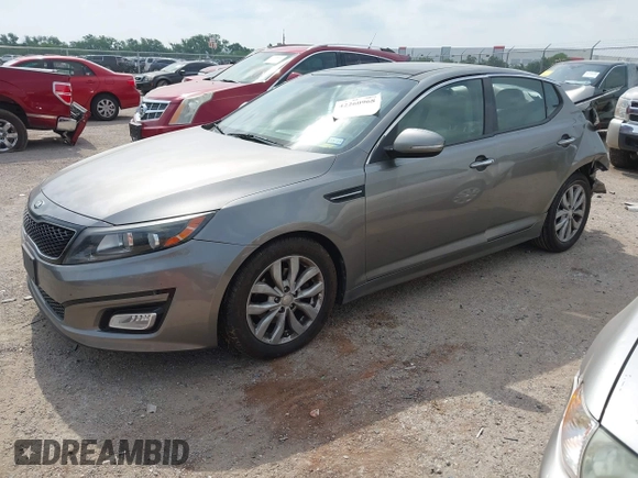 2015 Kia Optima EX with VIN 5XXGN4A70FG442402, listed as a IAAI auction lot 42260968 with 94,512 mi miles and . Bid and sale history available at DreamBid. Image 2.