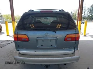 1999 Toyota Sienna LE with VIN 4T3ZF13C4XU166786, listed as a IAAI auction lot 42057995 with 316,259 mi miles. Bid and sale history available at carsss.com. Image 16.