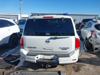2015 Nissan Armada Platinum z VIN 5N1BA0NF7FN611136, wystawiony jako IAAI lot #41375085 z przebiegiem 130 819 mil mil oraz . Historia ofert i sprzedaży dostępna na DreamBid. Obrazek 16.