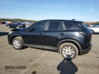 2014 Mazda CX-5 Sport with VIN JM3KE4BE1E0371547, listed as a Copart auction lot 85412744 with 119,597 mi miles and Salvage Title. Bid and sale history available at carsss.com. Image 2.