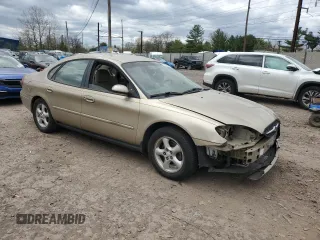 2001 Ford Taurus SE with VIN 1FAFP53U81G113131, listed as a Copart auction lot 51780905 with 85,094 mi miles and Salvage title. Bid and sale history available at DreamBid. Image 4.