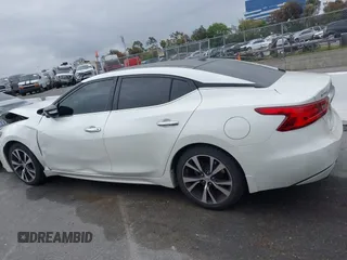2018 Nissan Maxima SL with VIN 1N4AA6AP9JC399142, listed as a IAAI auction lot 42115954 with 77,191 mi miles and . Bid and sale history available at DreamBid. Image 14.