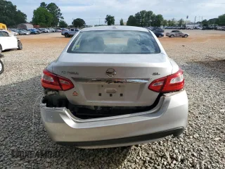 2016 Nissan Altima SL with VIN 1N4AL3APXGC270182, listed as a Copart auction lot 58143795 with 124,074 mi miles and Salvage title. Bid and sale history available at DreamBid. Image 6.