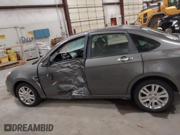 2009 Ford Focus SEL with VIN 1FAHP37N39W253086, listed as a IAAI auction lot 41825983 with 158,720 mi miles. Bid and sale history available at carsss.com. Image 13.