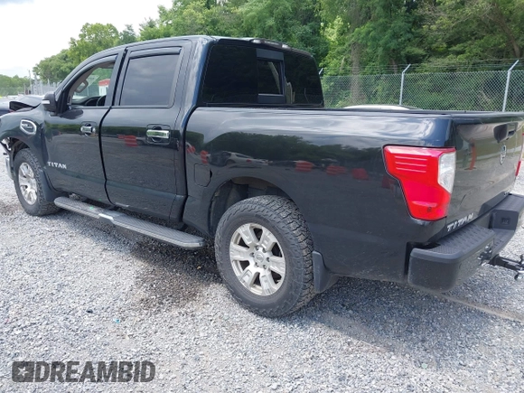 2017 Nissan Titan SV with VIN 1N6AA1E58HN542504, listed as a IAAI auction lot 42564921 with 161,555 mi miles and . Bid and sale history available at DreamBid. Image 3.