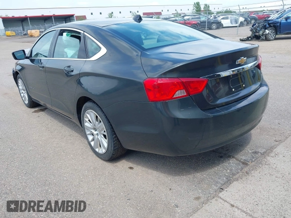 2014 Chevrolet Impala LS with VIN 1G11X5SL0EU164667, listed as a IAAI auction lot 42542110 with 150,458 mi miles and . Bid and sale history available at DreamBid. Image 3.