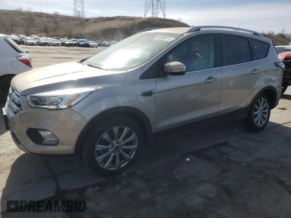 2017 Ford Escape Titanium with VIN 1FMCU9JD8HUE83650, listed as a Copart auction lot 48498245 with 103,920 mi miles and Salvage Title. Bid and sale history available at carsss.com. Image 1.