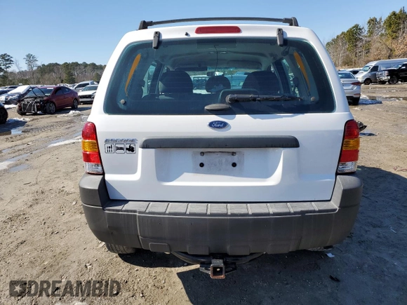 2006 Ford Escape XLS с VIN 1FMYU02Z76KC13880, выставлен на аукционе Copart как лот 45431285 с пробегом 133 326 миль миль и Чистый • Clean title. История ставок и продаж доступна на DreamBid. Изображение 6.