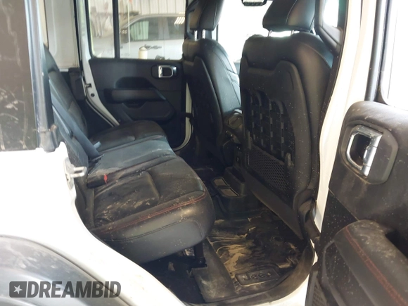 2022 Jeep Wrangler Unlimited Rubicon with VIN 1C4JJXFM0NW154202, listed as a IAAI auction lot 42400067 with 60,486 mi miles and . Bid and sale history available at DreamBid. Image 8.