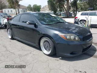 2008 Scion tC Spec with VIN JTKDE167X80256518, listed as a IAAI auction lot 42238691 with 245,294 mi miles and . Bid and sale history available at DreamBid. Image 1.