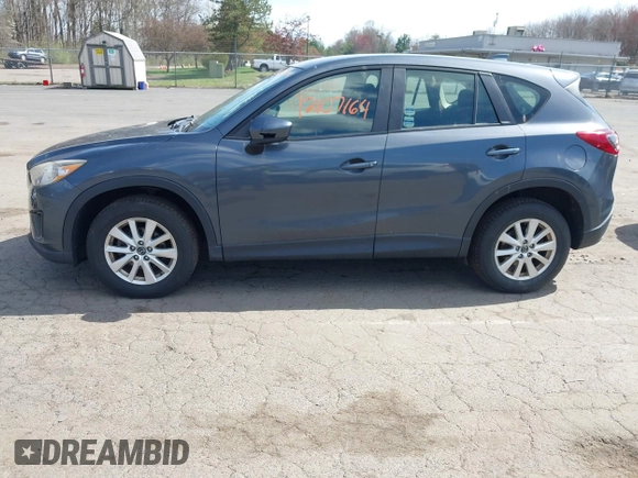 2013 Mazda CX-5 Sport with VIN JM3KE4BE7D0164398, listed as a IAAI auction lot 42107164 with 166,852 mi miles. Bid and sale history available at carsss.com. Image 14.