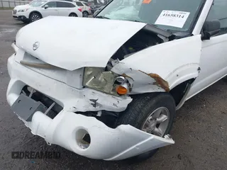 2004 Nissan Frontier XE with VIN 1N6DD26T54C403203, listed as a IAAI auction lot 41658314 with 203,648 mi miles and . Bid and sale history available at DreamBid. Image 18.