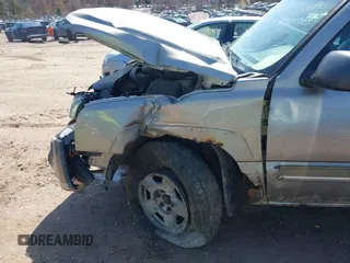 2003 Chevrolet Silverado 1500 LS with VIN 2GCEK19T231104873, listed as a IAAI auction lot 41910444 with 208,692 mi miles. Bid and sale history available at carsss.com. Image 6.