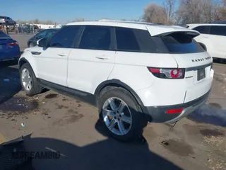 2014 Land Rover Range Rover Evoque Pure Plus z VIN SALVP2BG7EH866285, wystawiony jako IAAI lot #41412019 z przebiegiem 127 636 mil mil oraz . Historia ofert i sprzedaży dostępna na DreamBid. Obrazek 3.