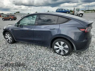 2024 Tesla Model Y Long Range with VIN 7SAYGDEE9RA255688, listed as a Copart auction lot 58918665 with 21,302 mi miles and Salvage title. Bid and sale history available at DreamBid. Image 2.