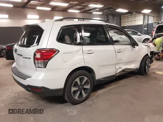 2018 Subaru Forester Premium with VIN JF2SJAEC6JH547549, listed as a IAAI auction lot 42050065 with 86,854 mi miles and . Bid and sale history available at DreamBid. Image 4.