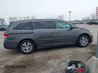 2014 Honda Odyssey EX-L with VIN 5FNRL5H62EB006346, listed as a IAAI auction lot 42061591 with 179,994 mi miles and . Bid and sale history available at DreamBid. Image 13.