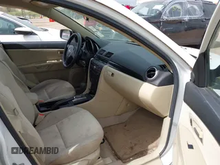2006 Mazda 3 i Touring with VIN JM1BK32F161401419, listed as a IAAI auction lot 42261618 with 96,772 mi miles and . Bid and sale history available at DreamBid. Image 5.