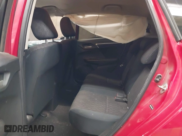 2016 Honda Fit LX with VIN JHMGK5H50GX003602, listed as a IAAI auction lot 42317398 with 58,612 mi miles and . Bid and sale history available at DreamBid. Image 8.