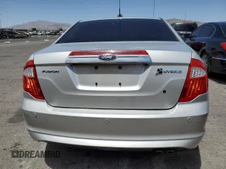 2010 Ford Fusion Hybrid z VIN 3FADP0L39AR273836, wystawiony jako Copart lot #54815095 z przebiegiem 245 960 mil mil oraz Czysty tytuł • Clean title. Historia ofert i sprzedaży dostępna na DreamBid. Obrazek 6.