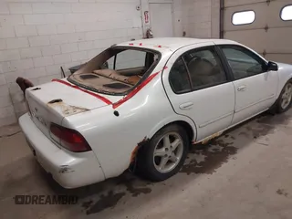 1998 Nissan Maxima GXE z VIN JN1CA21A9WM805626, wystawiony jako IAAI lot #42497316 z przebiegiem 195 991 mil mil oraz . Historia ofert i sprzedaży dostępna na DreamBid. Obrazek 4.