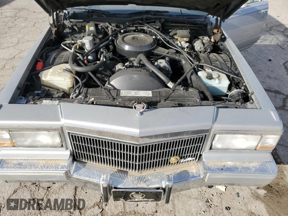 1990 Cadillac Brougham z VIN 1G6DW5476LR721785, wystawiony jako Copart lot #47170405 z przebiegiem Nie podano mil oraz Szkody całkowita. Historia ofert i sprzedaży dostępna na DreamBid. Obrazek 12.