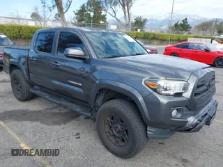 2017 Toyota Tacoma SR5 with VIN 3TMAZ5CN7HM036078, listed as a IAAI auction lot 41698163 with 91,376 mi miles. Bid and sale history available at carsss.com. Image 1.