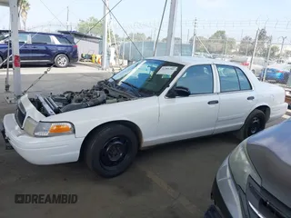 2009 Ford Police Interceptor with VIN 2FAHP71V29X129265, listed as a IAAI auction lot 42381382 with Not provided miles and . Bid and sale history available at DreamBid. Image 14.
