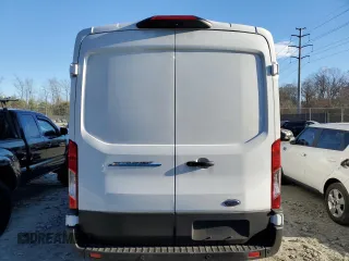 2023 Ford E-Transit Cargo with VIN 1FTBW9CK1PKB93878, listed as a Copart auction lot 82899604 with 6,009 mi miles and Salvage Title. Bid and sale history available at carsss.com. Image 6.