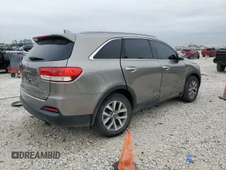 2016 Kia Sorento L with VIN 5XYPG4A34GG027362, listed as a Copart auction lot 84928684 with 154,502 mi miles and Salvage Title. Bid and sale history available at DreamBid. Image 3.